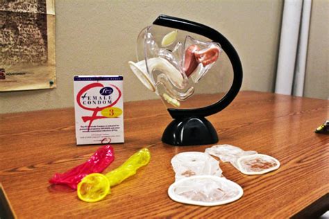 Take care not to poke a hole in the condom while taking it out of the wrapper. If the condom has a little receptacle (small pouch) at the tip of it (to collect semen), begin rolling the condom onto the penis with the receptacle left empty so that semen can fill it. Be sure to squeeze the air out of the receptacle end. 